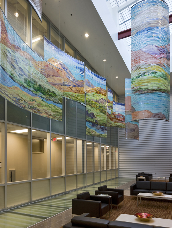 
        While most units are fixed and suspended from the ceiling soffit, three units rotate gently with the air currents.        