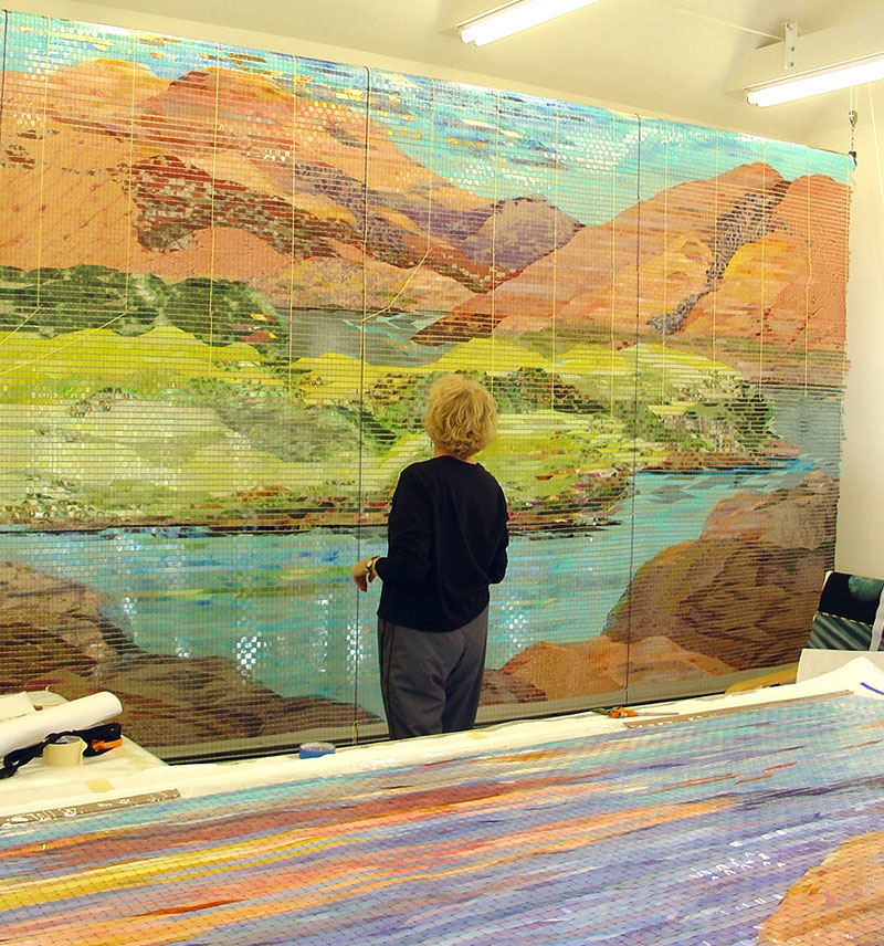 
        Here I am adding final touches to the final three panels before the sewing process.        